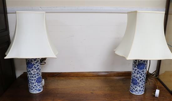 A pair of Chinese blue and white vases, mounted as lamps